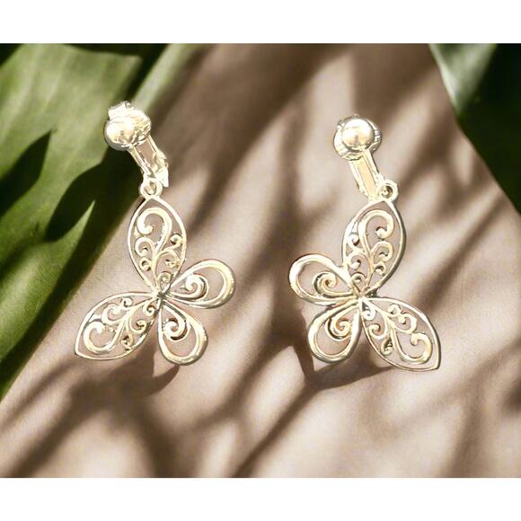 Clip on 1 1/2" silver and black cutout dangle butterfly earrings - Picture 2 of 4